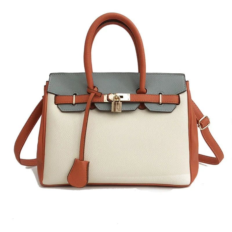 Mugrs top handle shoulder Kelly tote handbag with timeless style