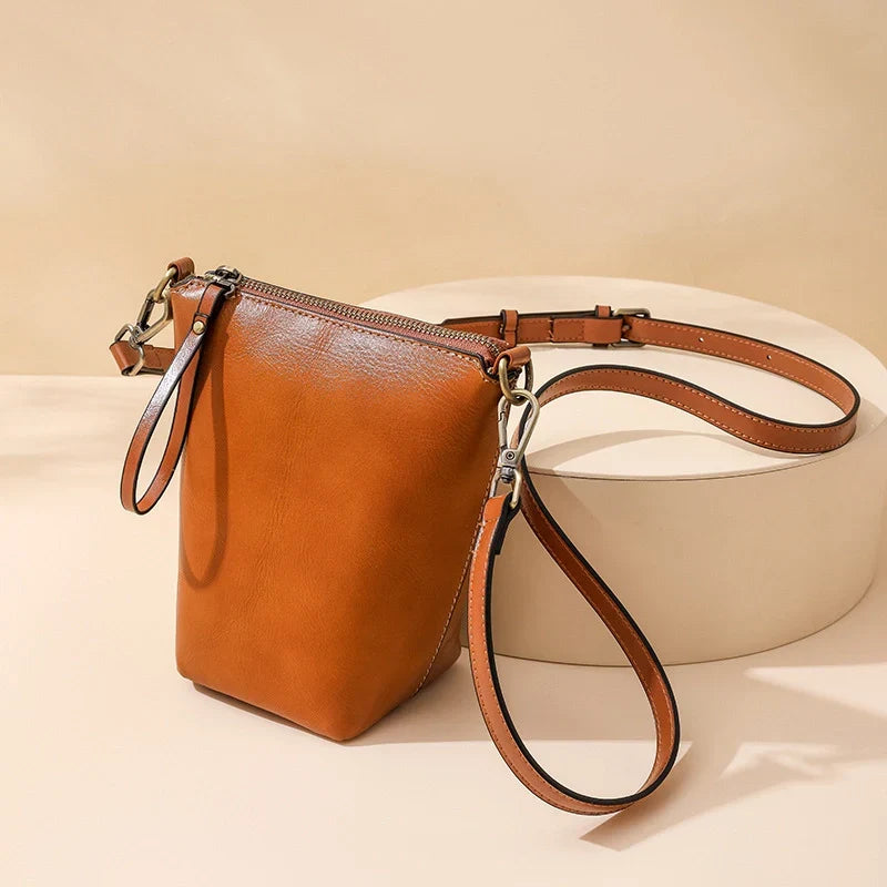 Mugrs vintage vegan leather bucket phone bag with classic silhouette