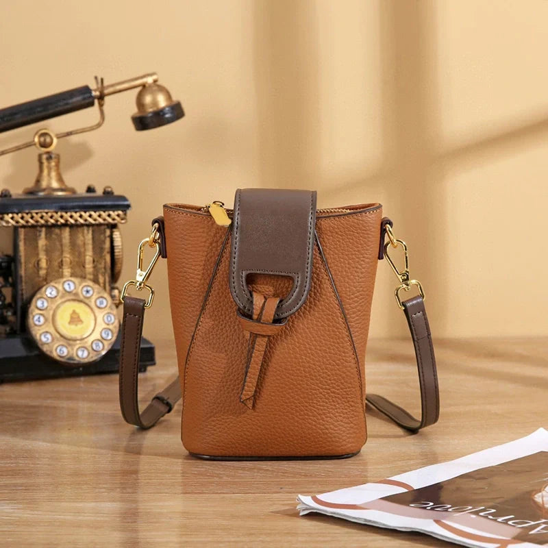 Mugrs popper leather crossbody phone bag with snap closure