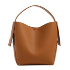 Mugrs bucket-style crossbody bag with drawstring closure