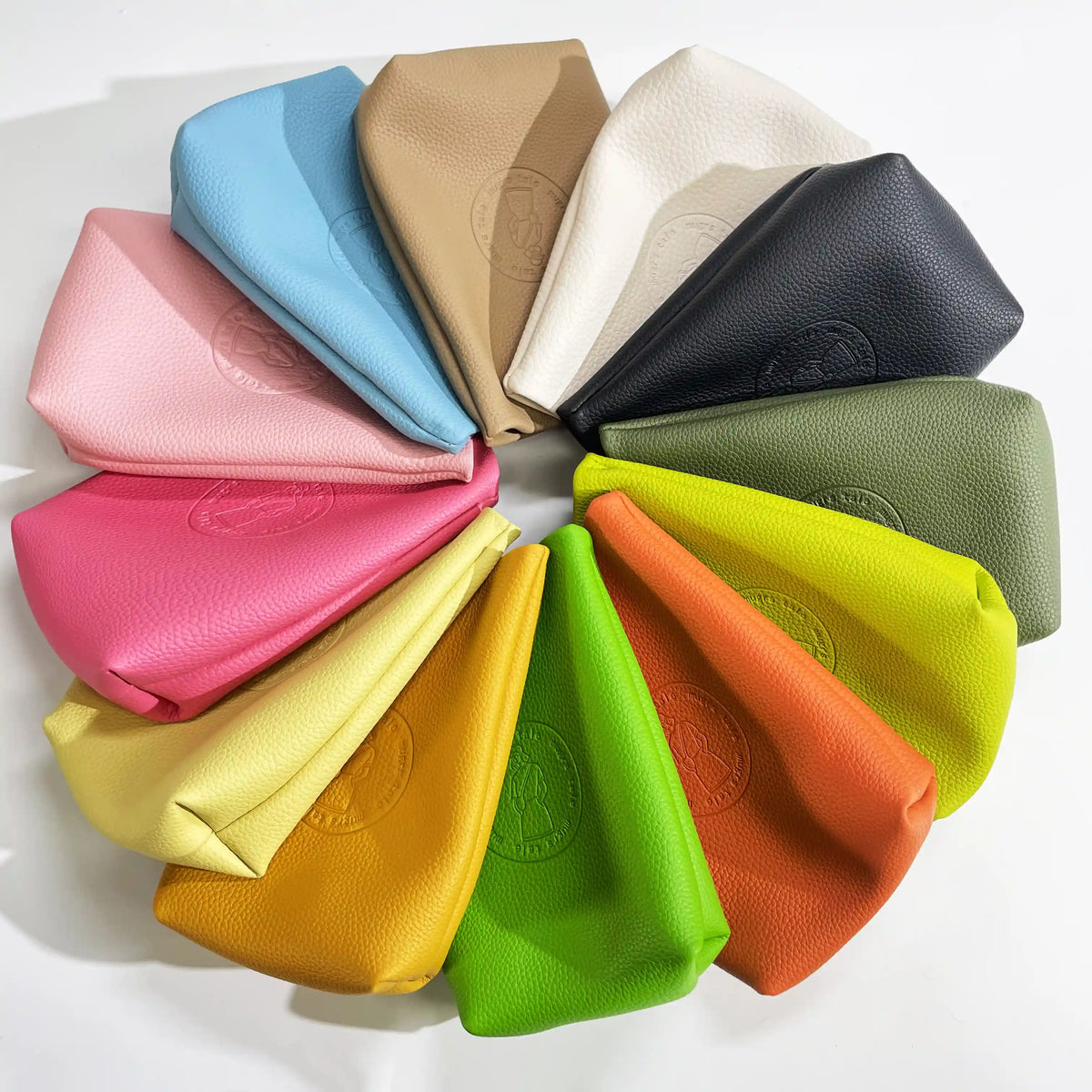 Mugrs 15-color vegan leather crossbody phone bag collection on white background - Black, Cream, Tan, Sage, Rose and more